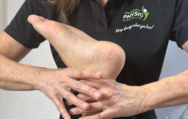 Physiotherapist providing back treatment